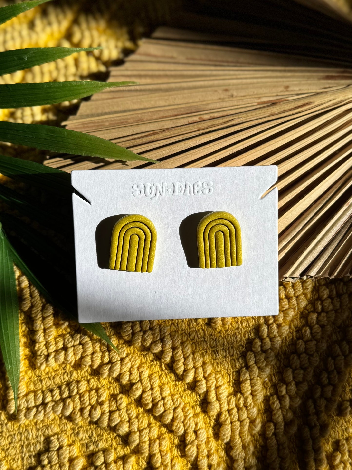 Arched rainbow studs