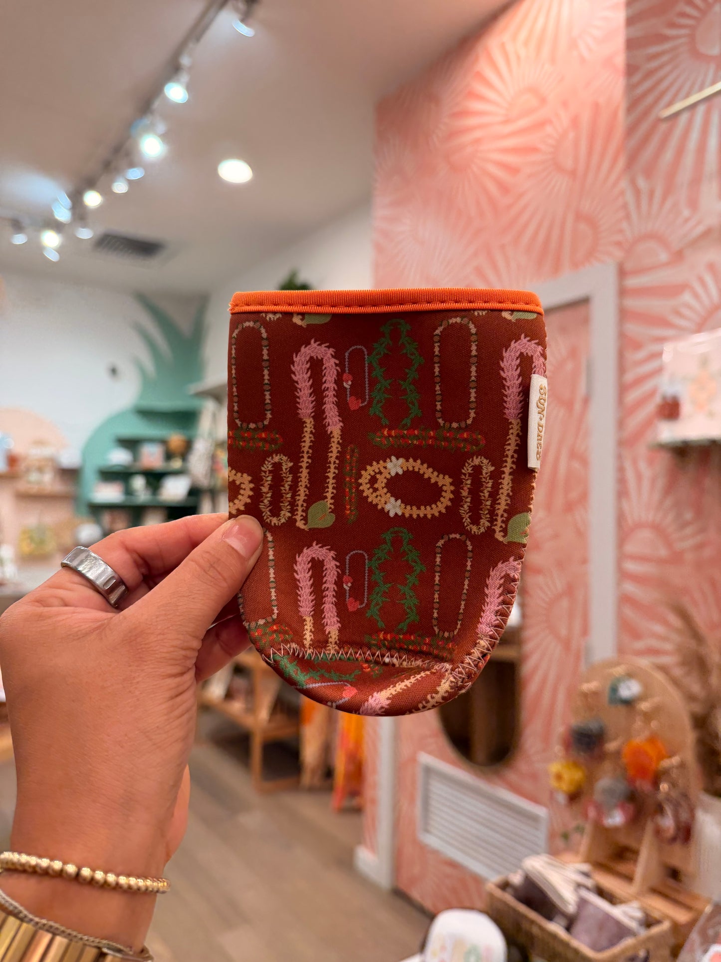 Cocoa lei coffee sleeve lg