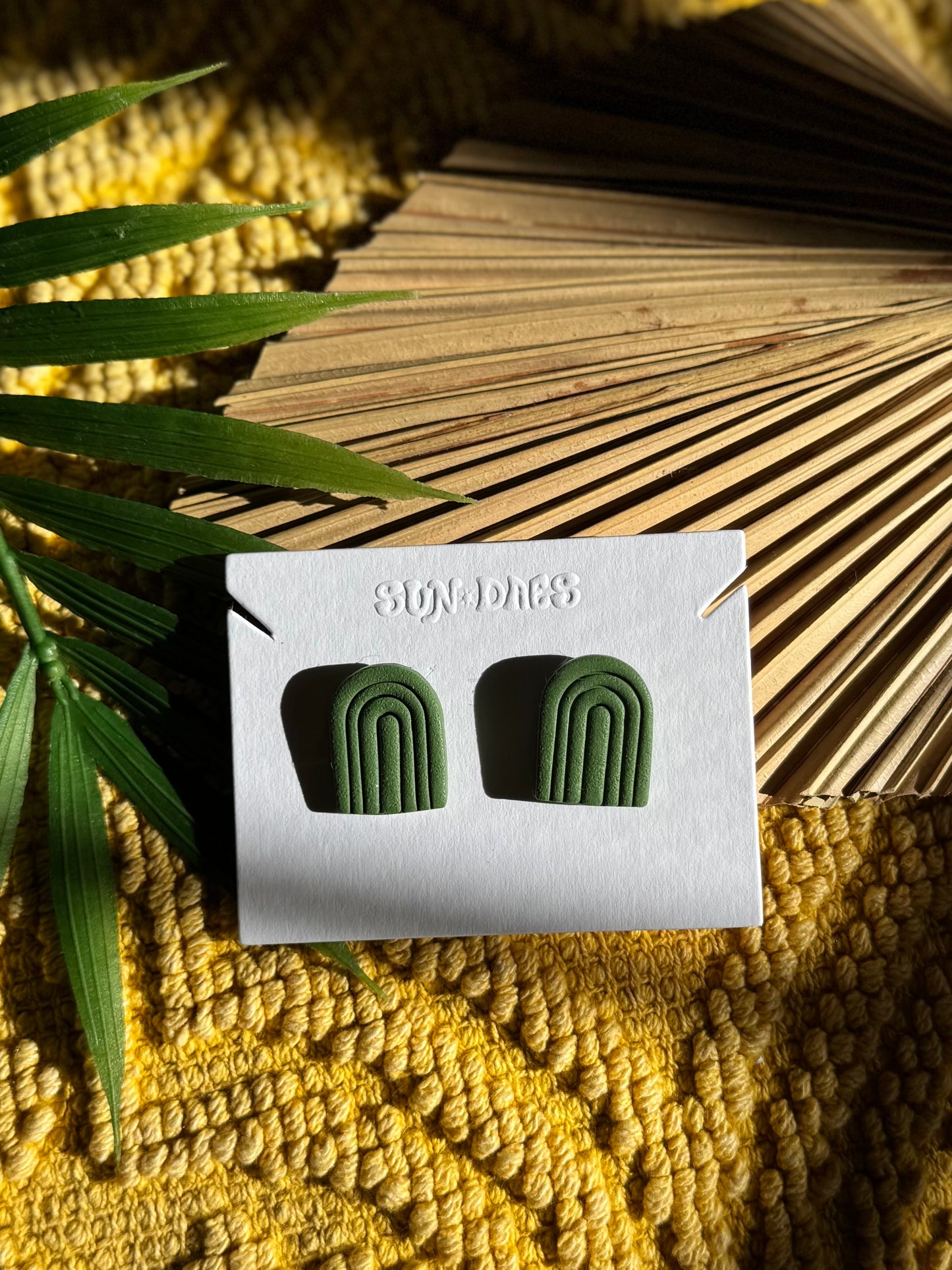 Arched rainbow studs