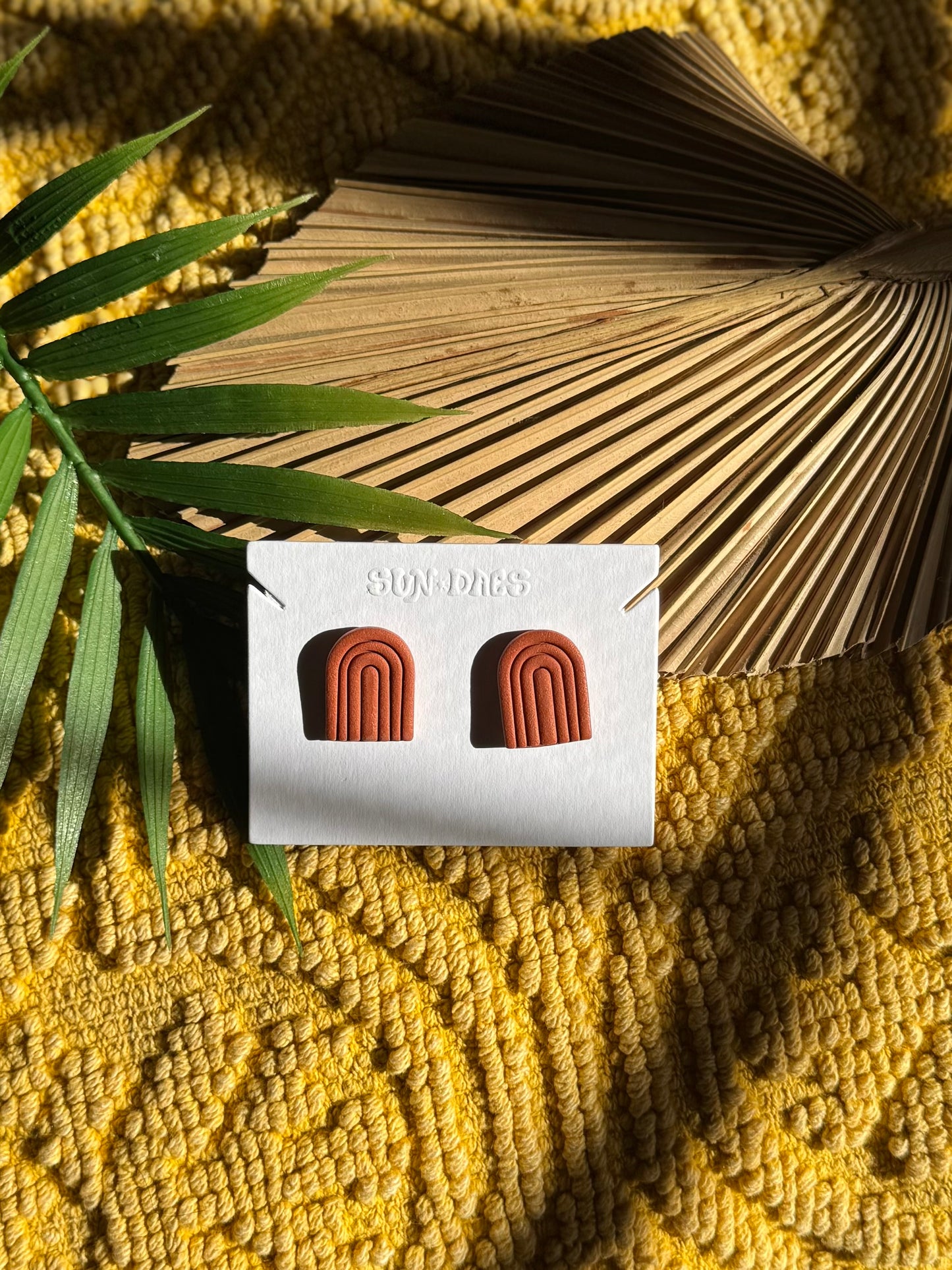 Arched rainbow studs
